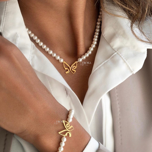 Pearl Bracelet with Gold Mother Butterfly