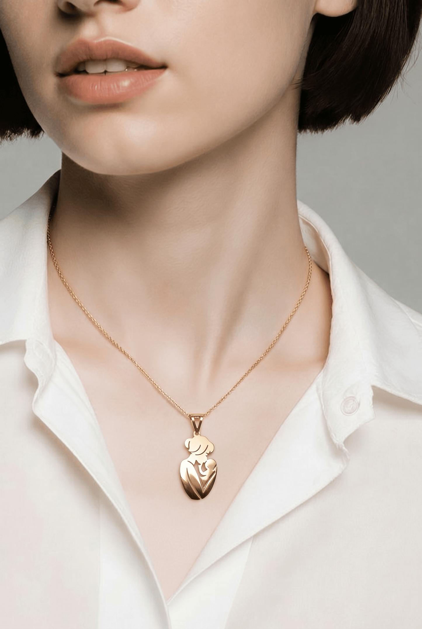 Mother and Child Gold Pendant