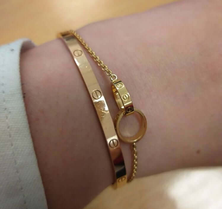 Amour Fashion Bracelet on a wrist, showcasing 18k gold craftsmanship and elegant design.