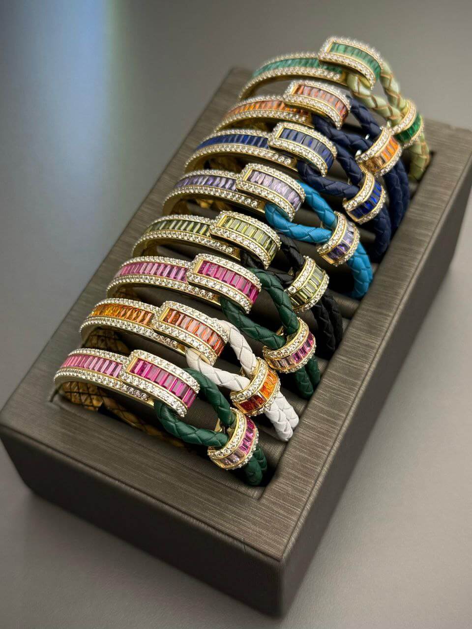 Leo Bracelet collection featuring 18K Solid Gold and vibrant Cubic Zirconia stones in multiple colors.