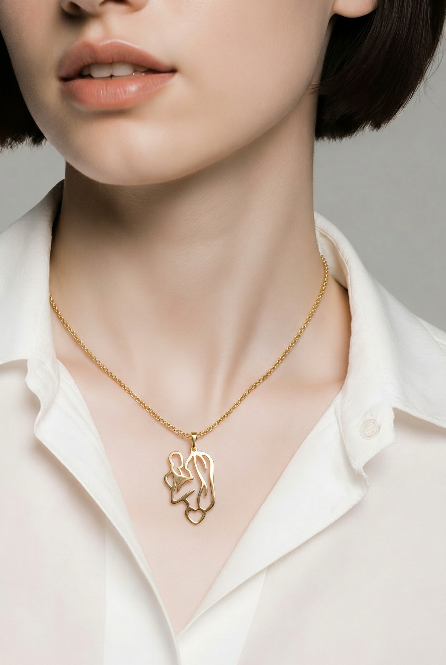 Mother and Baby Love Gold Pendant